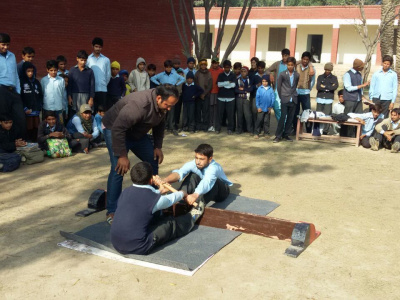 Mas-wrestling is becoming more popular in Pakistan. Photo