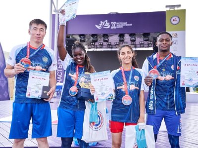 International mas-wrestling teams clash again on Russky Island 