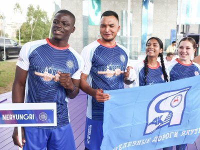International mas-wrestling teams clash again on Russky Island 