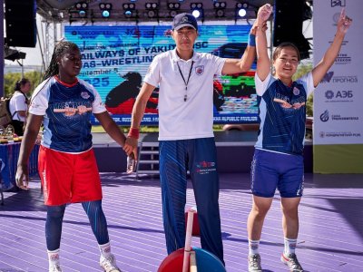 International mas-wrestling teams clash again on Russky Island 