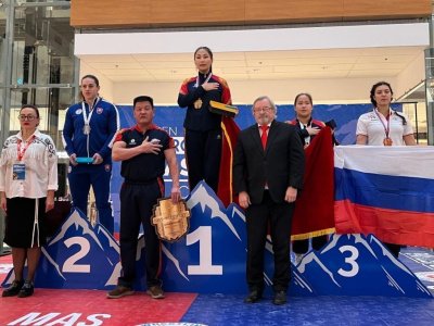 Pavel Cherngoradsky, Ivan Galkin, and Eldana Bolotbekova became the European Mas-Wrestling Absolute Champions 