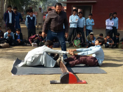 Mas-wrestling is becoming more popular in Pakistan. Photo