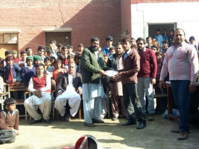 Mas-wrestling is becoming more popular in Pakistan. Photo