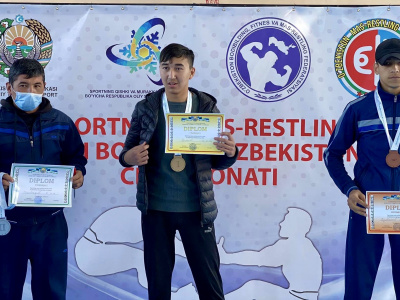 Participants of the Uzbekistan Mas-Wrestling Championship greet friends around the world