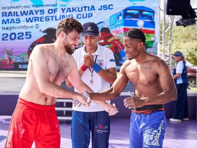 International mas-wrestling teams clash again on Russky Island 