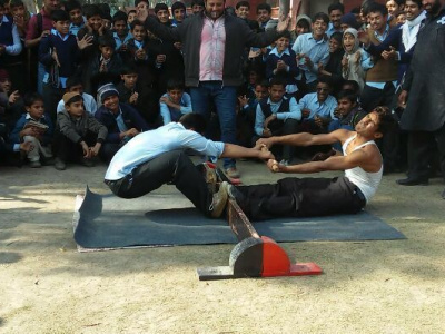 Mas-wrestling is becoming more popular in Pakistan. Photo