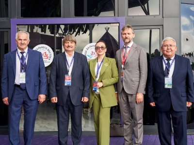 International mas-wrestling teams clash again on Russky Island 