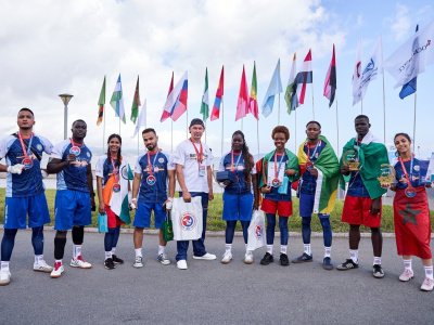 International mas-wrestling teams clash again on Russky Island 