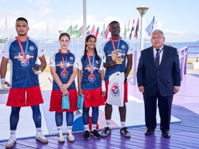International mas-wrestling teams clash again on Russky Island 