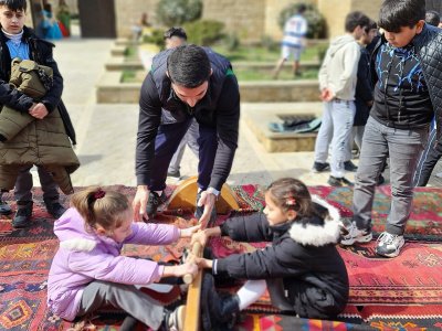 Sports Ambassador Khayyam Orujov and Arif Shakhlarov presented mas-wrestling at the Novruz holiday in Baku