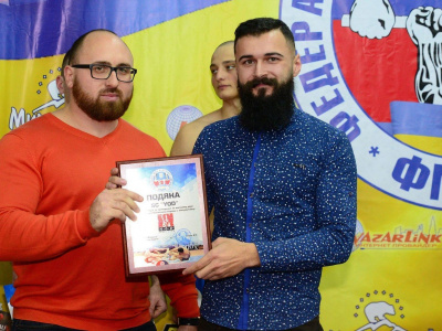 Mas-wrestling Federation of Ukraine has expanded their range. Photo