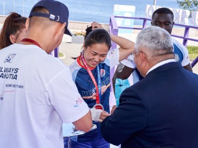 International mas-wrestling teams clash again on Russky Island 