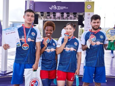 International mas-wrestling teams clash again on Russky Island 