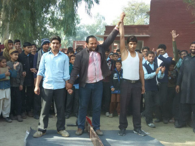 Mas-wrestling is becoming more popular in Pakistan. Photo