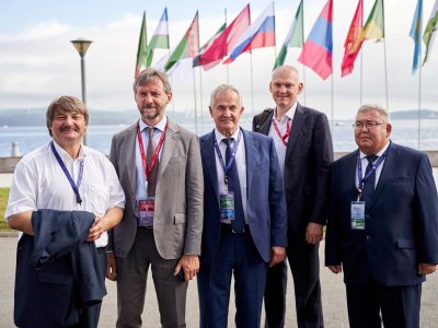 International mas-wrestling teams clash again on Russky Island 