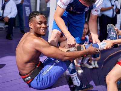 International mas-wrestling teams clash again on Russky Island 