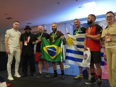 The South American Mas-wrestling Championship kicked off with friendly embraces